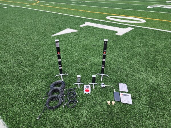 Sports timing equipment on a football field.