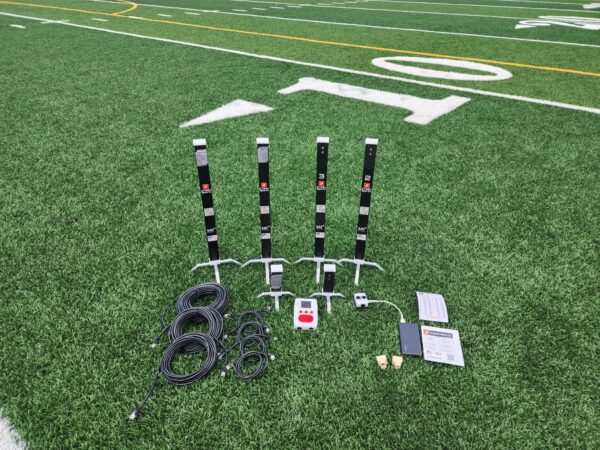 Timing equipment setup on football field.