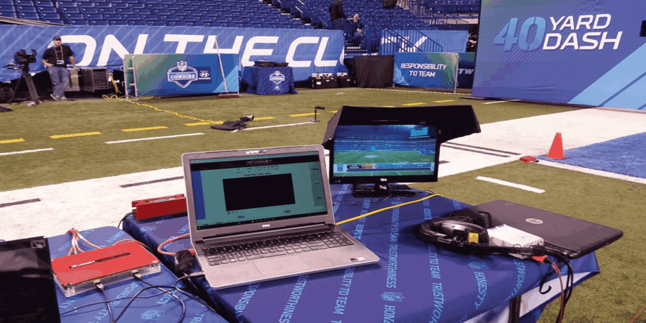 A laptop and television are on the table.