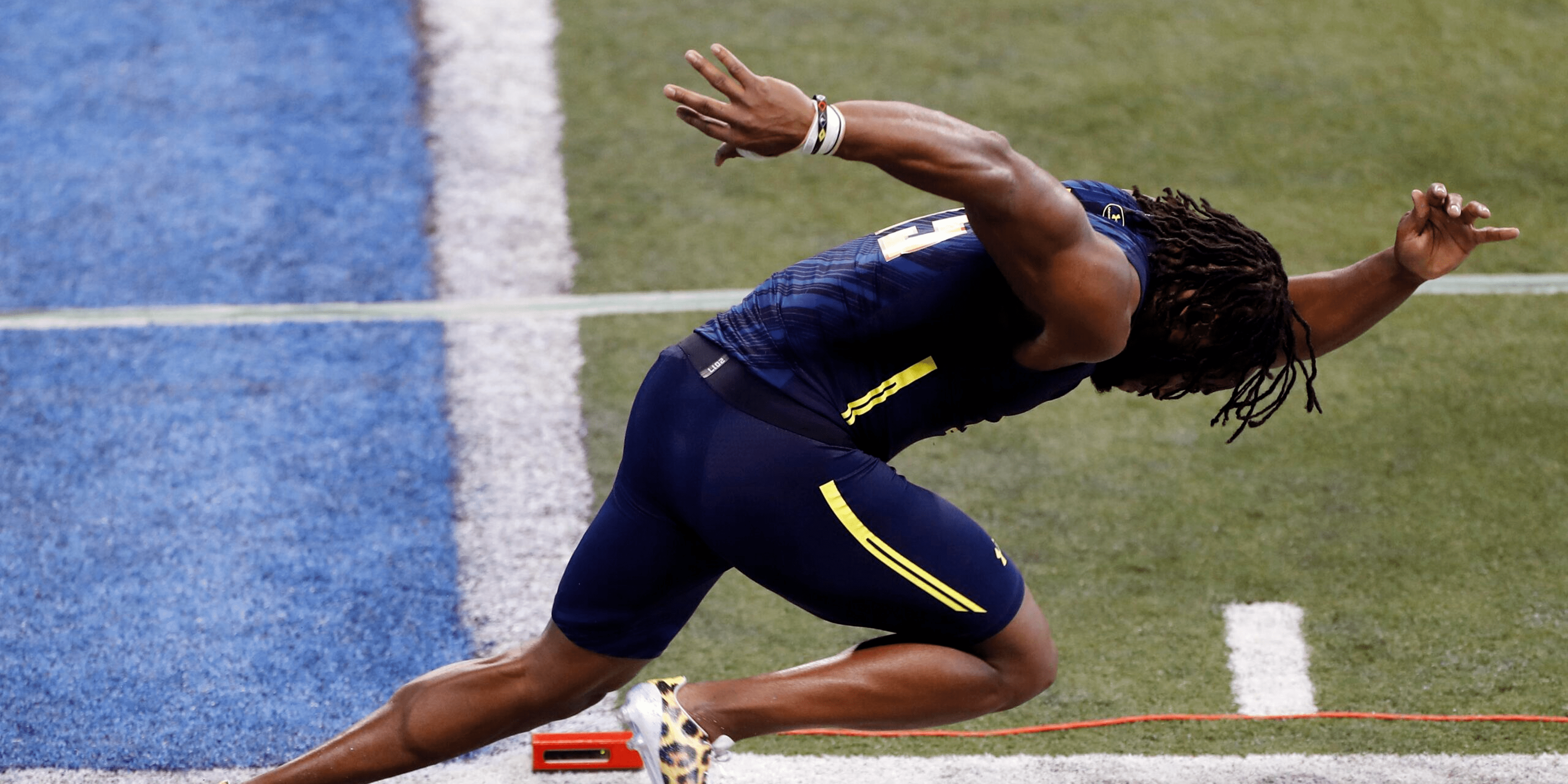 Athlete starting a sprint on track.